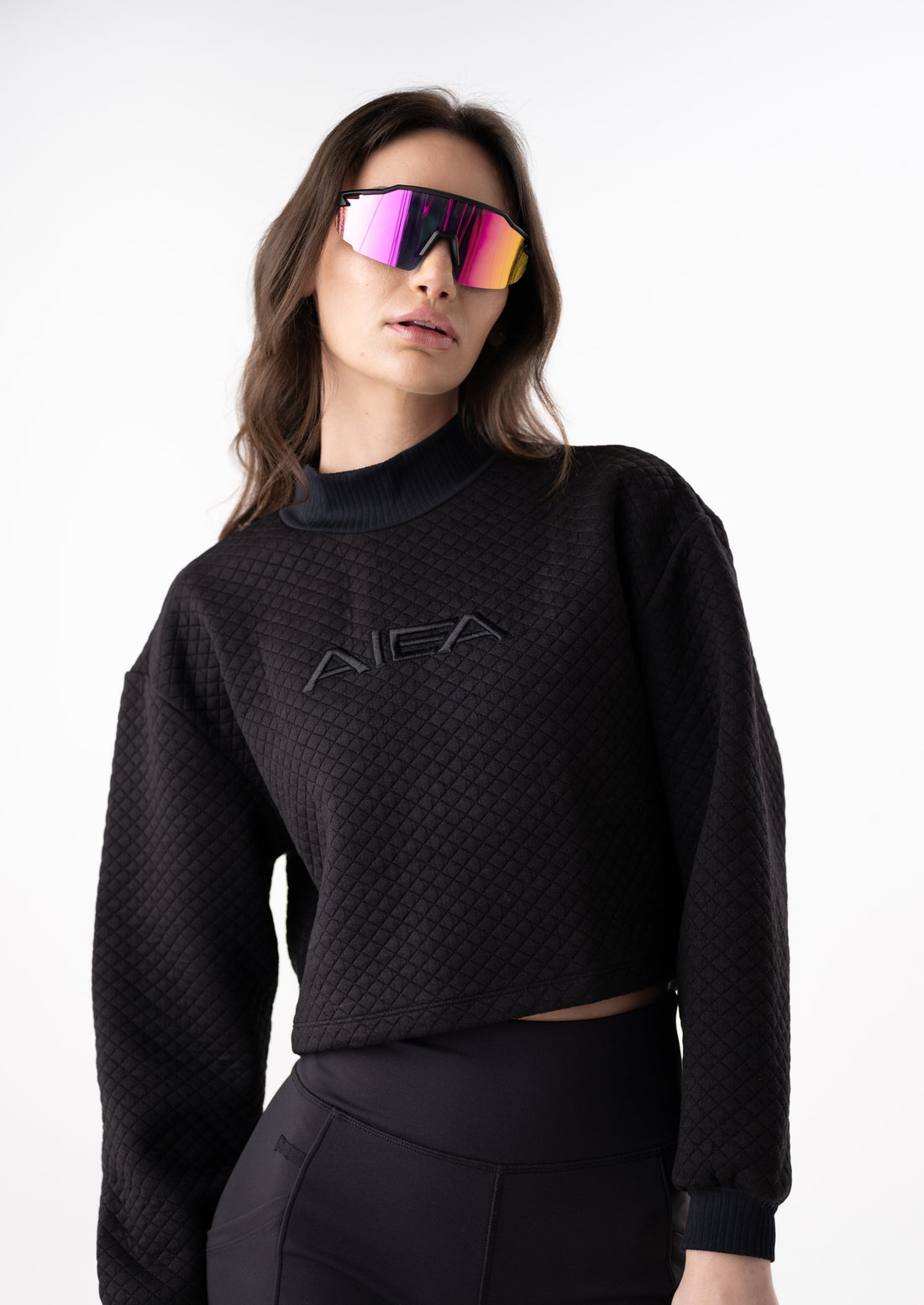 AIEA Golf textured pullover sweater in black with black embroidered central logo