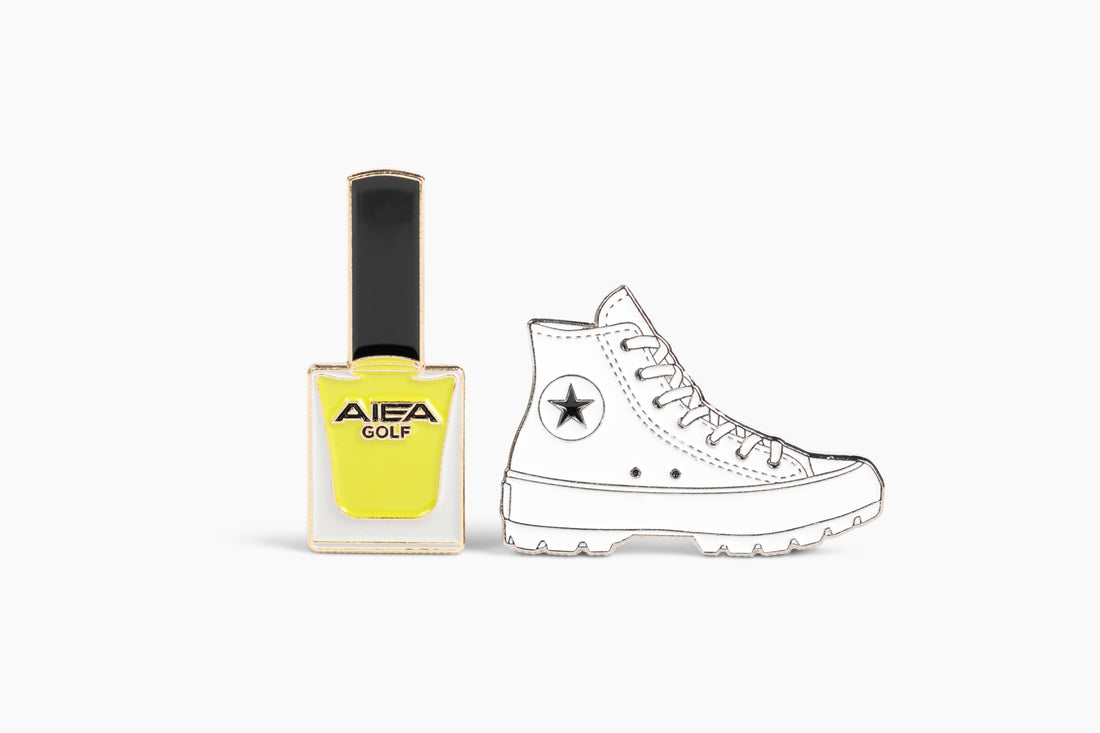 nail polish and high top sneaker metal golf ball markers